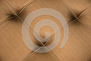 Close up Brown Leather sofa for texture abstract background