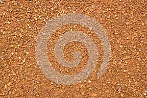 Close up for brown and orange gravel rock texture and background