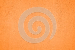 Close-up of brown or orange textured concrete background photo