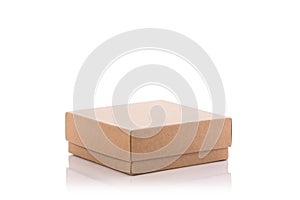 Close up brown paper box. Studio shot isolated on white