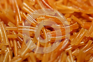 A close up of browned in Butter sweet Egyptian vermicelli cooked with water and sugar in a cooking pot