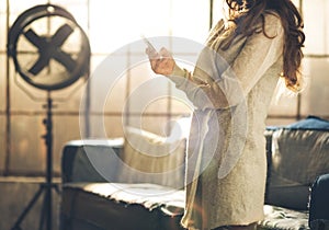 Close-up a brunette woman in a loft living room