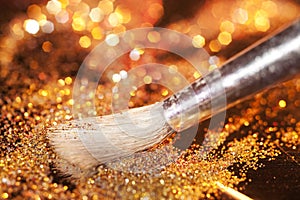 Close-up on brush and shining powder