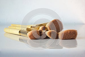 Close up of brushes makeup applicators. photo