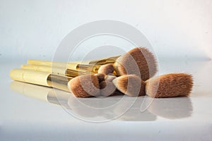 Close up of brushes makeup applicators.