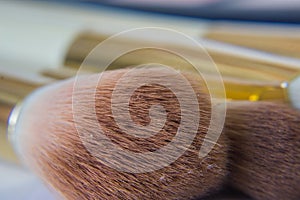 Close up of brushes makeup applicators.