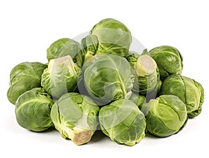 A close-up of Brussels Sprouts, set against a white backdrop