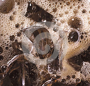 Close-up of bubbling dark brew