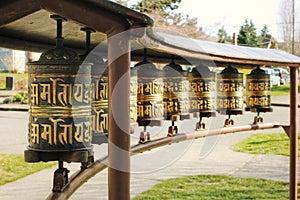 Close up of Buddhist street prayer drums