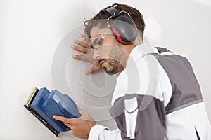 close up builder working with grinding tool