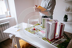 Close-up of building model on table in office