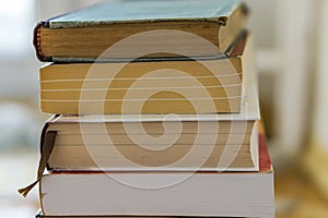 Close up of a bunch of paper books, novels. Concept education an