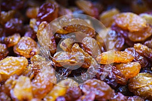 Close-up of a bunch of raisins, with out of focus background