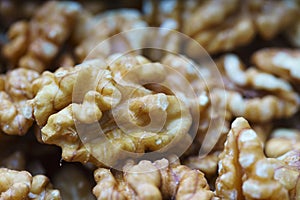 Close-up of a bunch of walnuts, with out of focus background. Horizontal view