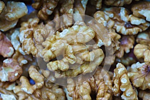 Close-up of a bunch of walnuts, with out of focus background. Horizontal view