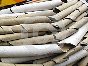 Close-up of bundles of cardboard tubes photo