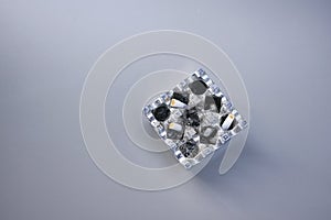 Close up burning cigarette in ashtray on table