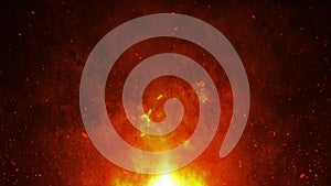 Close-up of a burning fire, bright sparks on a black background. Yellow-red and orange fire flames glow and burn on a