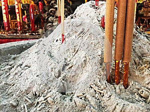 Close up of the burning incense sticks in Thailand temple