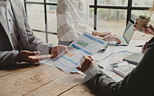 Close up.business colleagues discussing new opportunities, plan refers to a set of agreements that guide a closely photo