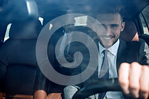 Close up.business colleagues sitting in the car.