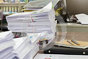 Close up of business documents stack on desk , report papers stack