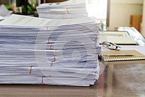 Close up of business documents stack on desk , report papers stack