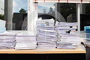 Close up of business documents stack on desk , report papers stack