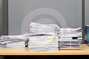 Close up of business documents stack on desk , report papers stack