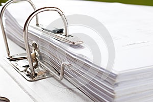 Close up of a business file folder with documents, storage of co