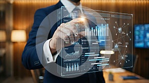 Close up of business hand pointing at advanced virtual data visualization dashboard with analytics and graphs.