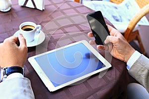 Close-up of business male hands touching digital tablet