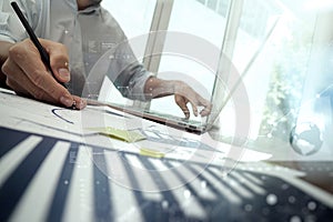 Close up of business man hand working on laptop computer