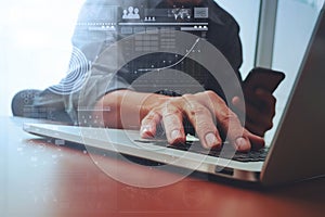 Close up of business man hand working on laptop computer