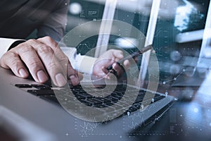 Close up of business man hand working on laptop computer