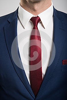 Close-up of business man wearing suit and tie