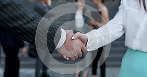 Close up Business People Shaking Hands Corporate Partnership Deal Welcoming Opportunity for Cooperation. Handshake of
