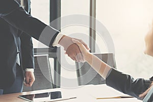 Close up of Business people shaking hands, finishing up meeting, business etiquette, congratulation, merger and acquisition