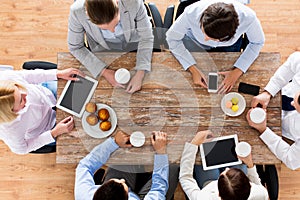 Close up of business team drinking coffee on lunch