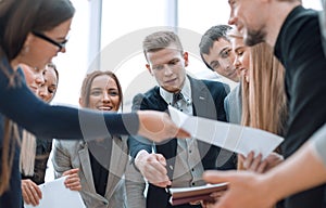 Close up. business team enthusiastically discuss working documents