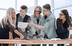 close up. business team enthusiastically discuss working documents