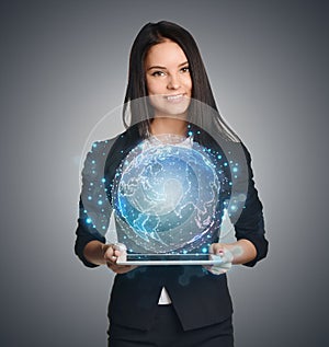 Close up of business woman holding digital globe