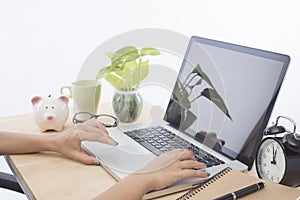 Close-up business women hand typing on a laptop