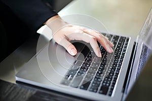 Close up of business women working with typing on laptop empty at workplace.Selective focus,business woman using laptop, searching