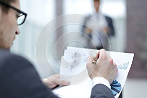 Close up.businessman checking financial data