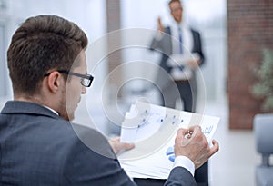 Close up.businessman checking financial data