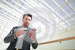 Close up.businessman dialing the number on the smartphone