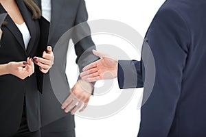 Close up.the businessman extends his hand for a handshake .isolated on white