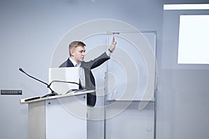 Close up.businessman giving a speech at a business seminar