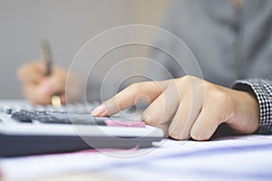 Close up hand business man are sitting using pen writing record